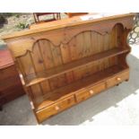 Victorian style stained pine wall rack, with shaped frieze above two shelves with three spice