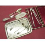 Pair of lobster picks and claw cracker in burgundy silk lined fitted case, a large silver plated