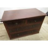 Edwardian walnut chest with two short and two long figured drawers,