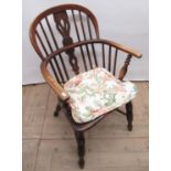 C19th ash and elm lowback Windsor armchair, turned supports joined by crinoline stretcher
