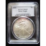 PCGS M69 graded 2009 USD $1 fine silver eagle dollar, slabbed and tagged