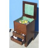 1930's oak sewing cabinet, hinged lid with fitted interior above pair of drawers on bracket feet,