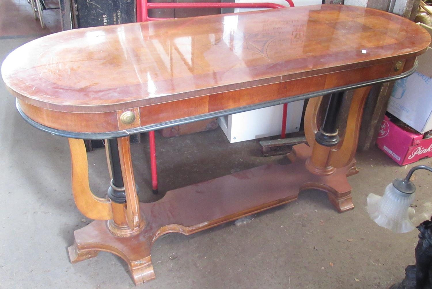 Empire style crossbanded walnut effect rectangular side table, rounded top on ebonised turned