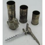 R.M.V. & Co, set of three graduated 1oz, 1.5oz, 2oz silver plated shot measures in form of shotgun