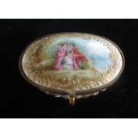 C18th Continental style porcelain oval box, gilt metal mounted hinged cover decorated with lovers in