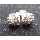 Pair of 9ct white gold diamond cluster earrings with round cut, claw set diamonds, 1.4g