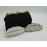 Silver beaded snap clasp purse, a similar white beaded bag together with a black textured handbag
