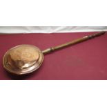 Late Victorian copper warming pan with turned fruitwood handle, with engraved decoration to the lid,