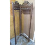 Indian carved hardwood two panelled screen frame, with pierced scrolled shield cresting, W59cm