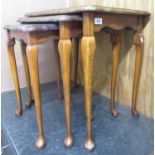 Nest of three occasional tables, shaped rectangular tops with inset glass panels on cabriole legs,