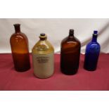 Stoneware flagon for O. Beach, Central Beverage Works Oswaldtwistle and three glass chemists bottles