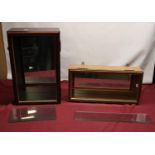 Two collectors/shop glazed display cases with glass shelves, largest H54cm, W34cm, D18cm