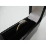 Hallmarked 9ct yellow gold diamond ring with cluster of round cut, claw set diamonds, London, 375,