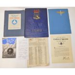 Collection of WWII books and manuals regarding flight training in the USA, including "pre-flight