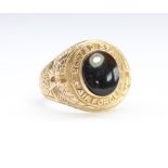 Mid C20th US Airforce 10 carat gold fraternity type signet ring with central black onyx stone,