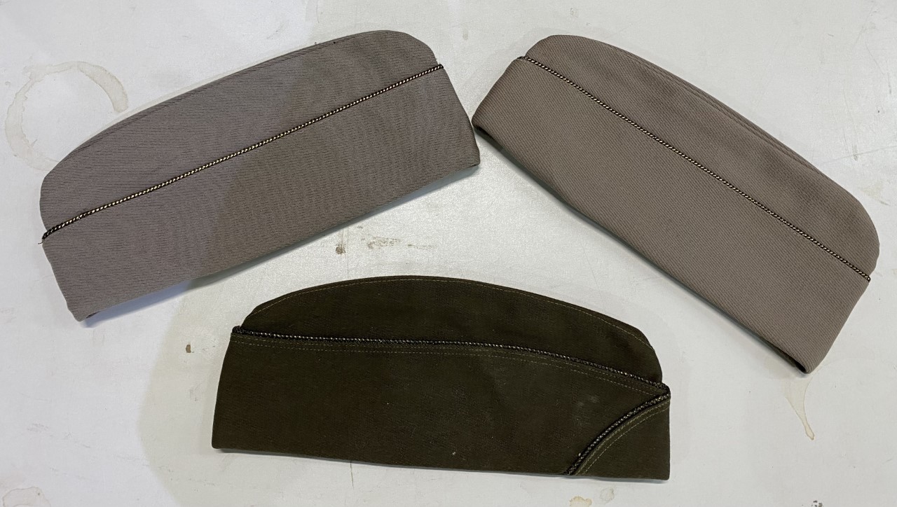 WWII pink garrison cap, still with price tag and two others (3)