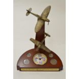 Danbury mint commemorative Battle of Britian clock with painted resin Spitfire and Bf109, four