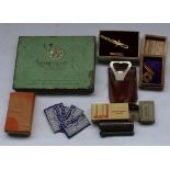 Collection of misc. militaria including 24ct gold plated props and wings USAAF tie pin, Dunhill