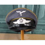 WWII Luftwaffe NCO's peaked cap with makers name Geber. Alm, Berlin, 1938, size 57, and pair of