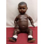 Armand Marseille model 351/9k bisque headed doll with no eyes, wearing white socks and black