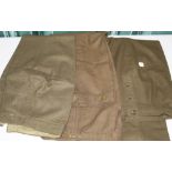 Three pairs of WWII American nurses wool battle dress trousers with side button fastenings, one pair