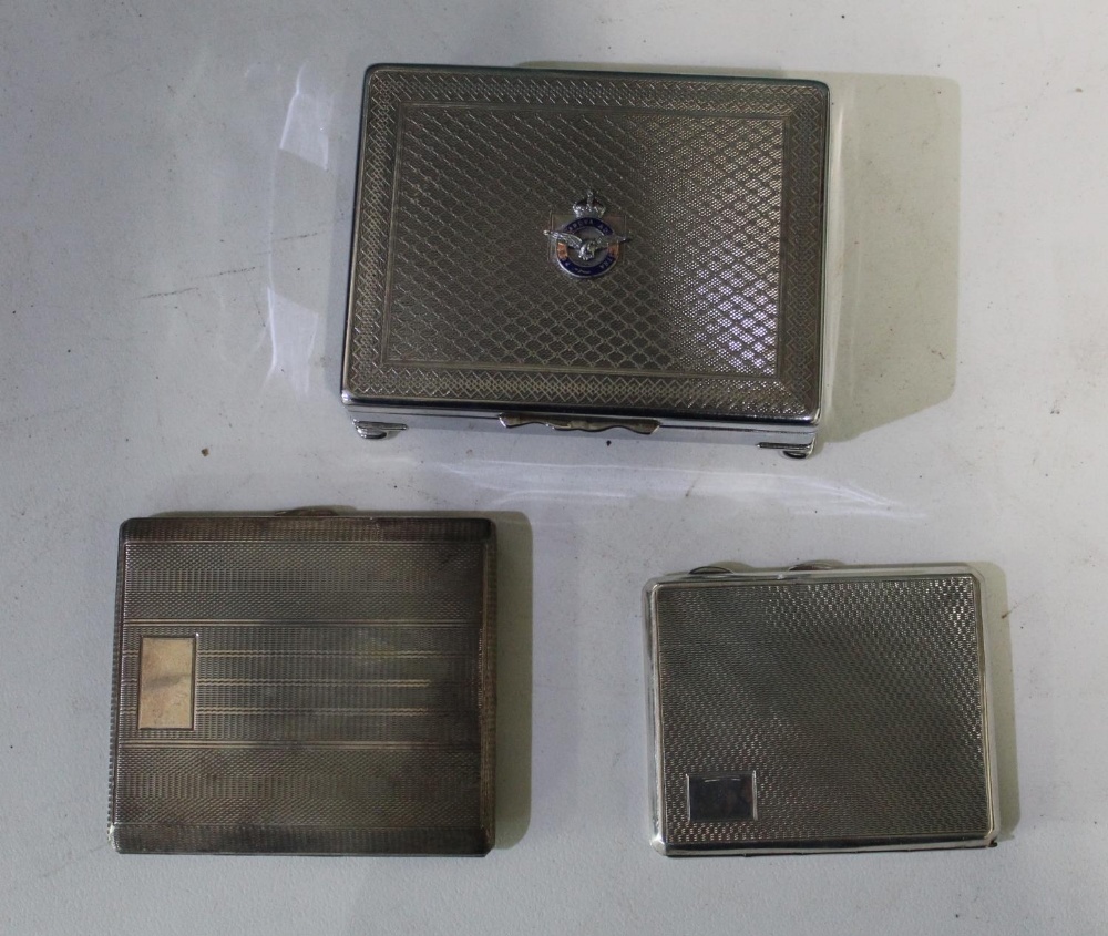 Chrome plated cigarette box with Airforce eagle motif, small chrome cigarette case and one other (3)