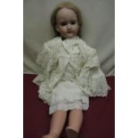 Armand Marseille 390N A 12 M bisque headed doll with articulated limbs, blonde wig, wearing white