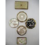 Stratton compact with Star carved in mother of pearl cover, a Stratton compact with flowers etched