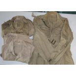 Set of three cotton military shirts, one by Elbeco, and military desert tunic with brass belt buckle