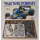 Tamiya 1/12 Wolf WR1 Ford F1 unstarted plastic model kit. All parts still factory sealed.
