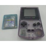 Gameboy Color with Pokemon Crystal game