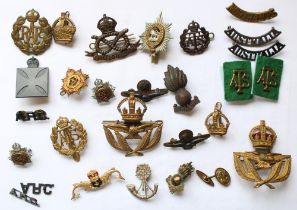 Selection British military regimental cap badges and shoulder titles with a few ROW examples, mainly