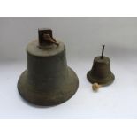 C19th Solid bronze cast bell (very heavy) H30cm, together with a smaller early C20th cast metal bell