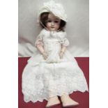 Max Handwerck bisque headed doll stamped to head and neck numbers 283-26 5, 0 1/4, brown curly