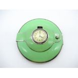 Art Deco green enamel circular compact, hinged lid with with Swiss made clock