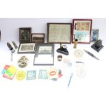 Selection of militaria and misc. collectable items including framed postcards, hand grenade