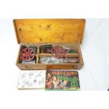 Wooden chest containing a large amount of vintage meccano with instructions, electric motor, wheels,