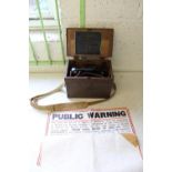 Boxed field telephone set "F", set with shoulder strap, and "Public Warning" poster depicting