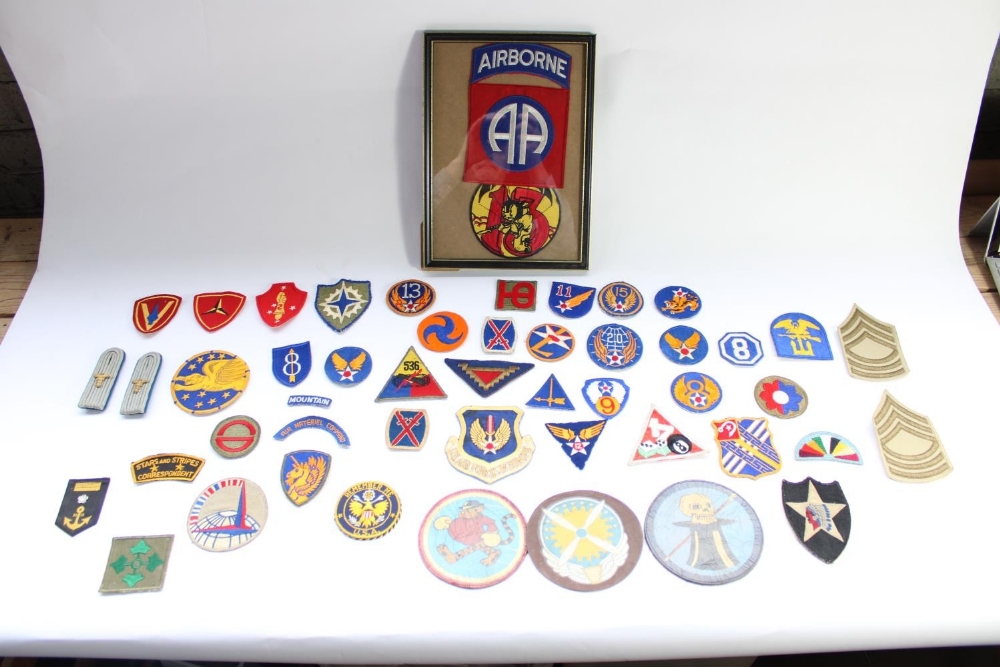 Good collection of US military regimental and squadron cloth badges and patches, mainly WW2 era
