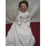 Alt Beck & Gottschalk bisque headed doll, stamped 1361/55 60, wearing short brown wig and