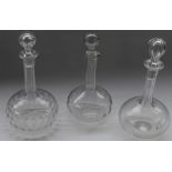 Set of three lead crystal glass decanters of various styles