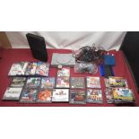 Playstation and PS2 consoles with games and controllers