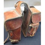 Quality pair of leather artillery saddlebags with side pockets and brass buckles, stamped 1904