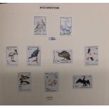 Various stamp albums including birds, Americas Cup and post office picture cards (5)