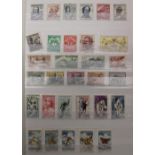 Two partially filled world stamp albums, unmounted mint, hinged & used, many countries represented