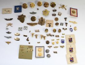 Large selection US military insignia, badges, titles, pips etc. Mostly WW2 era with a small few