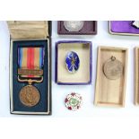 Selection of Japanese WW2 period medals and badges, mainly Red Cross with a select few other