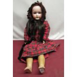 Heubach Koppelsdorf 250.3 bisque headed doll, with black wig, wearing a tartan dress and bonnet,