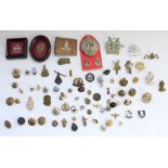 Selection of loose cap badges, sweetheart brooches, buttons etc. mainly British military
