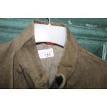 Military overall with single breast pocket and brass buttons, two dust coats (3)